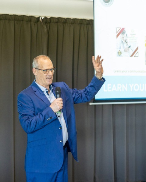 Andy Rolston keynote speaker Auckland on stage